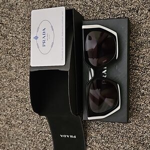 Prada sunglasses used twice